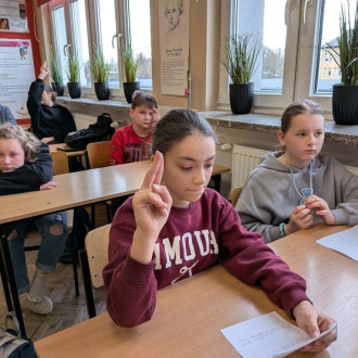 Uczniowie podczas spotkania z panem Mariuszem Turkiem