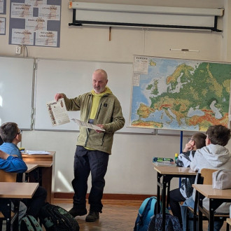 Uczniowie podczas spotkania z panem Mariuszem Turkiem